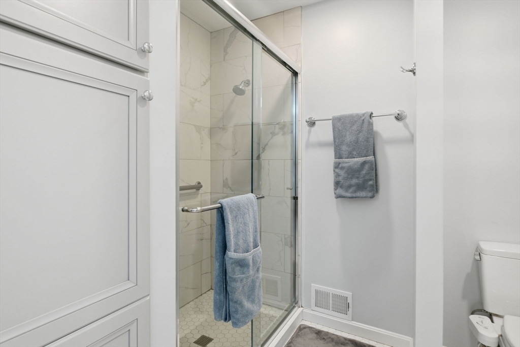 6 Shattuck Road Hadley, MA 01035 - Photo 24 of 40 a bathroom with a shower and toilet