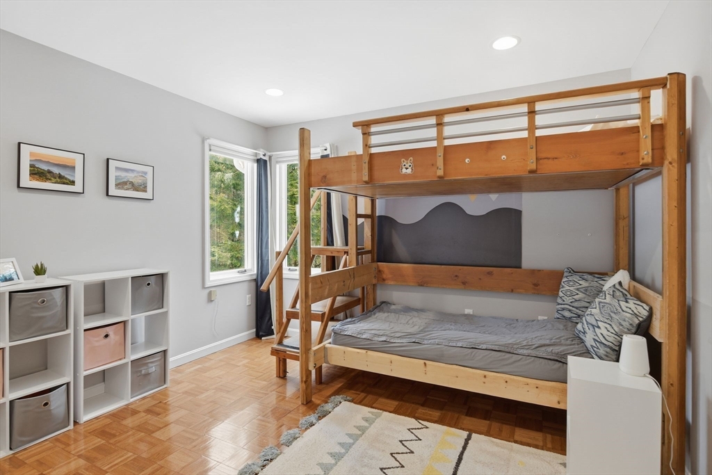 6 Shattuck Road Hadley, MA 01035 - Photo 25 of 40 a bedroom with a bed window and a table in it