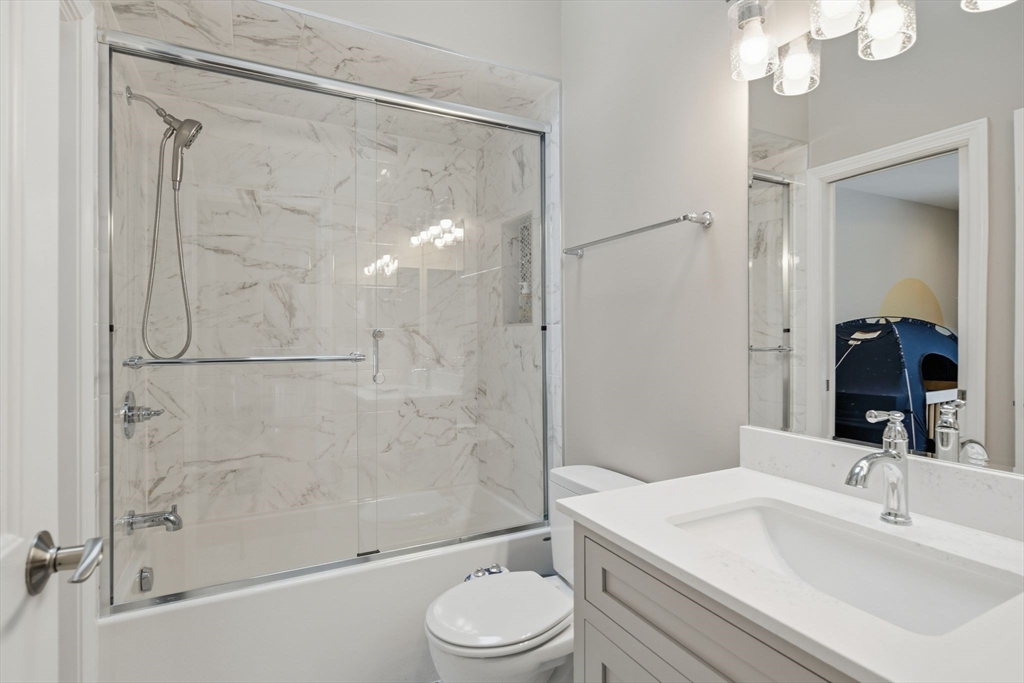 6 Shattuck Road Hadley, MA 01035 - Photo 27 of 40 a bathroom with a sink a toilet and shower