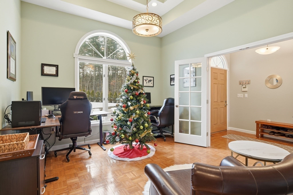 6 Shattuck Road Hadley, MA 01035 - Photo 5 of 40 a living room with furniture chandelier and a large window