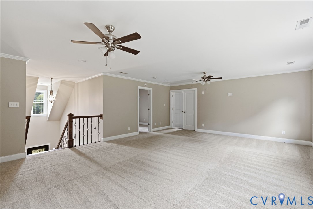 15220 River Road Chesterfield, VA 23838 - Photo 35 of 65 Spacious carpeted room featuring crown molding, tw