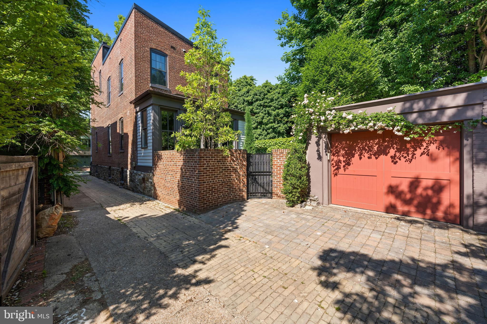 3420 P Street Northwest Washington, DC 20007 - Photo 2 of 32 a view of a yard with a tree