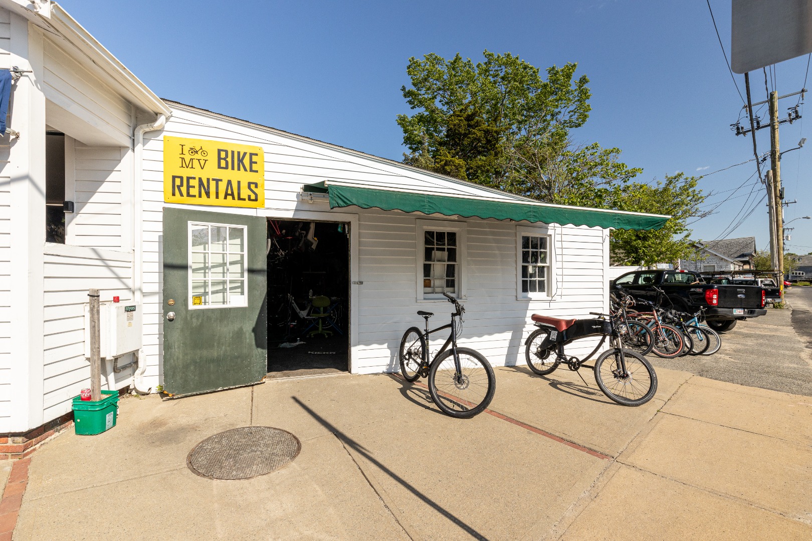 4 Lagoon Pond Road Vineyard Haven, MA 02568 - Photo 7 of 9 a view of a patio with table and chairs potted plants with wooden fence