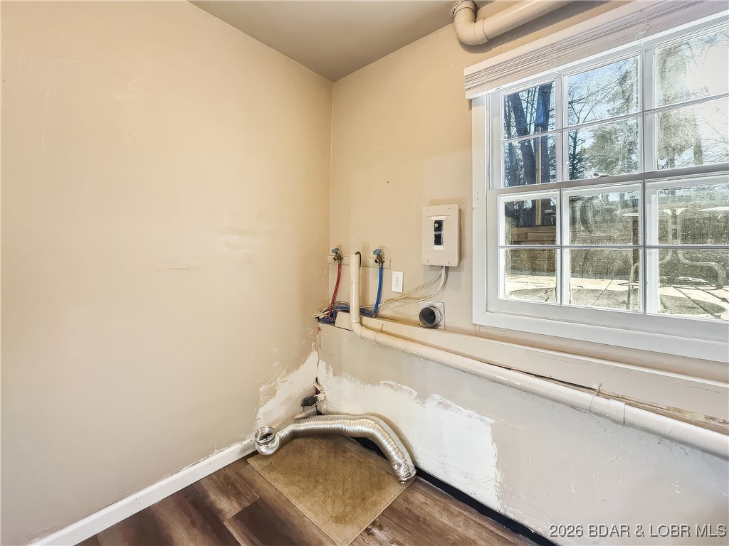 160 Bridgeview Road Camdenton, MO 65020 - Photo 36 of 49 Entry from garage to washer/dryer area.