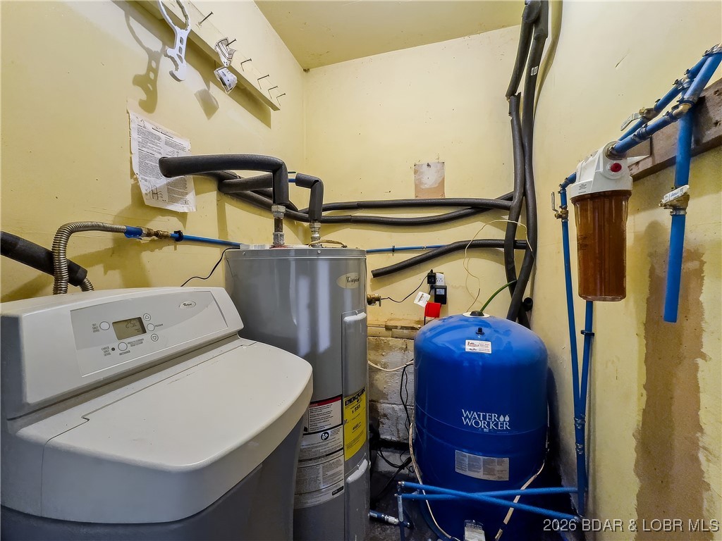 160 Bridgeview Road Camdenton, MO 65020 - Photo 39 of 49 Hot water heater, softener and new water pump.