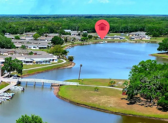 an aerial view of a pool patio swimming pool and outdoor seating