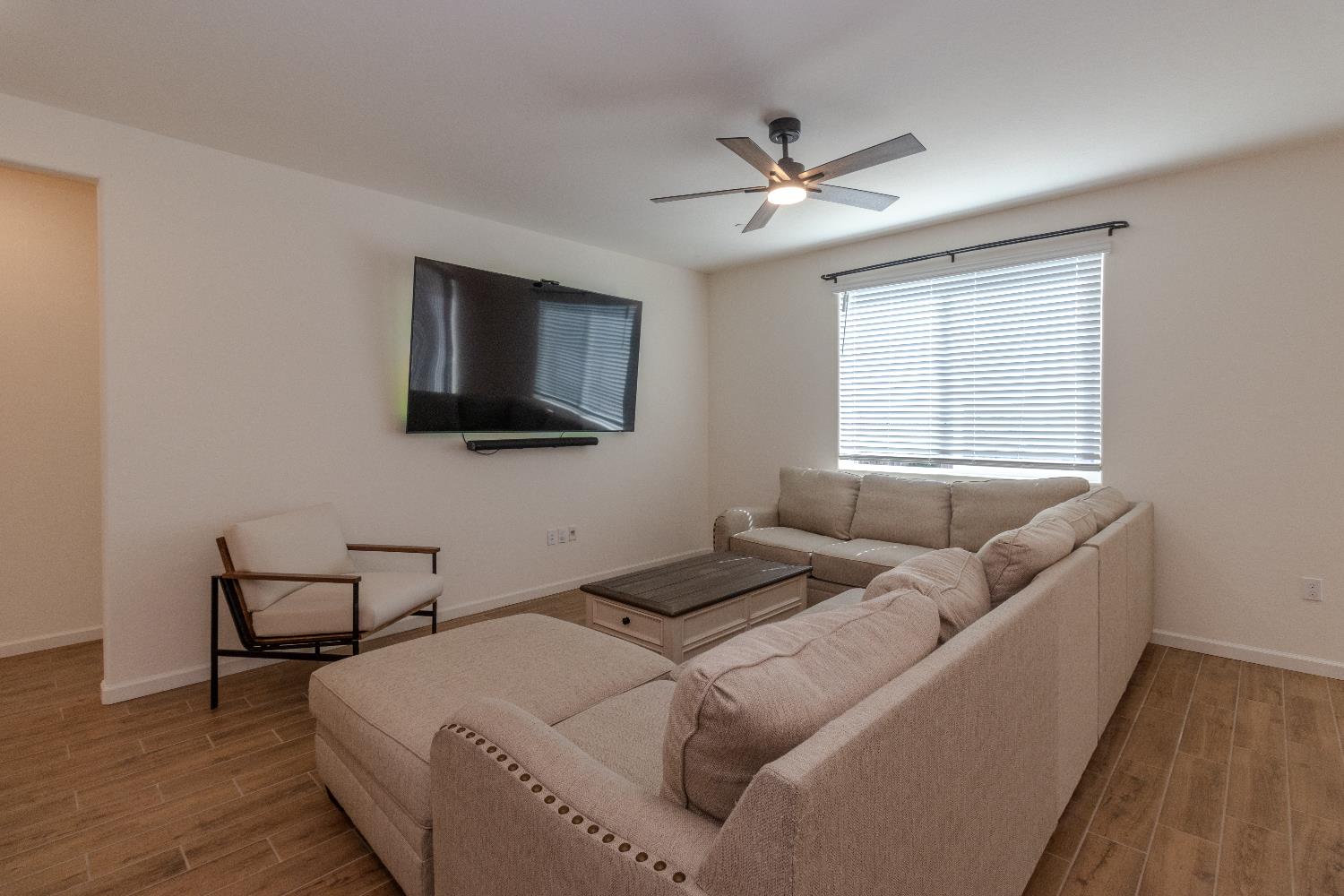 1158 Encore Way West Madera, CA 93636 - Photo 7 of 45 a bedroom with a bed and a flat screen tv