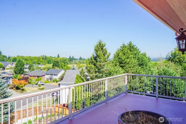 a view of a balcony with an outdoor space