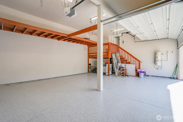 a view of an empty room with stairs