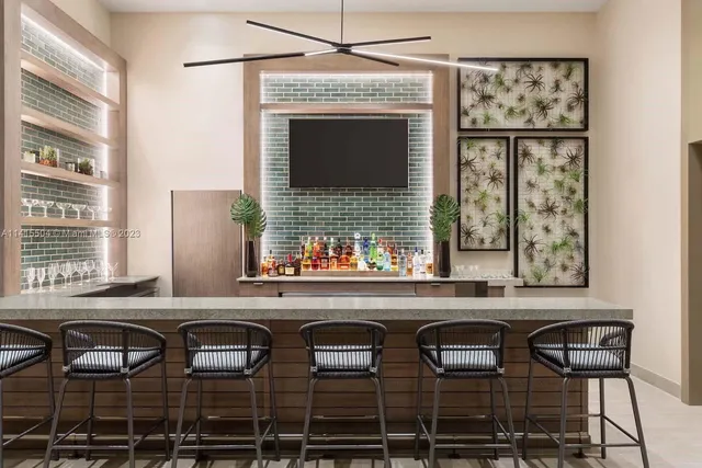 a kitchen with a sink and wooden cabinets