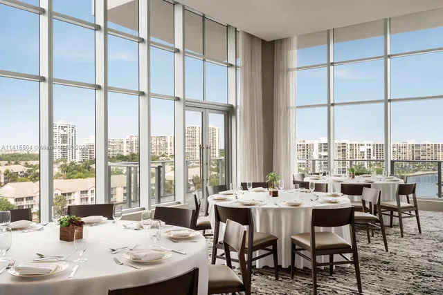 a dining room with furniture window and view