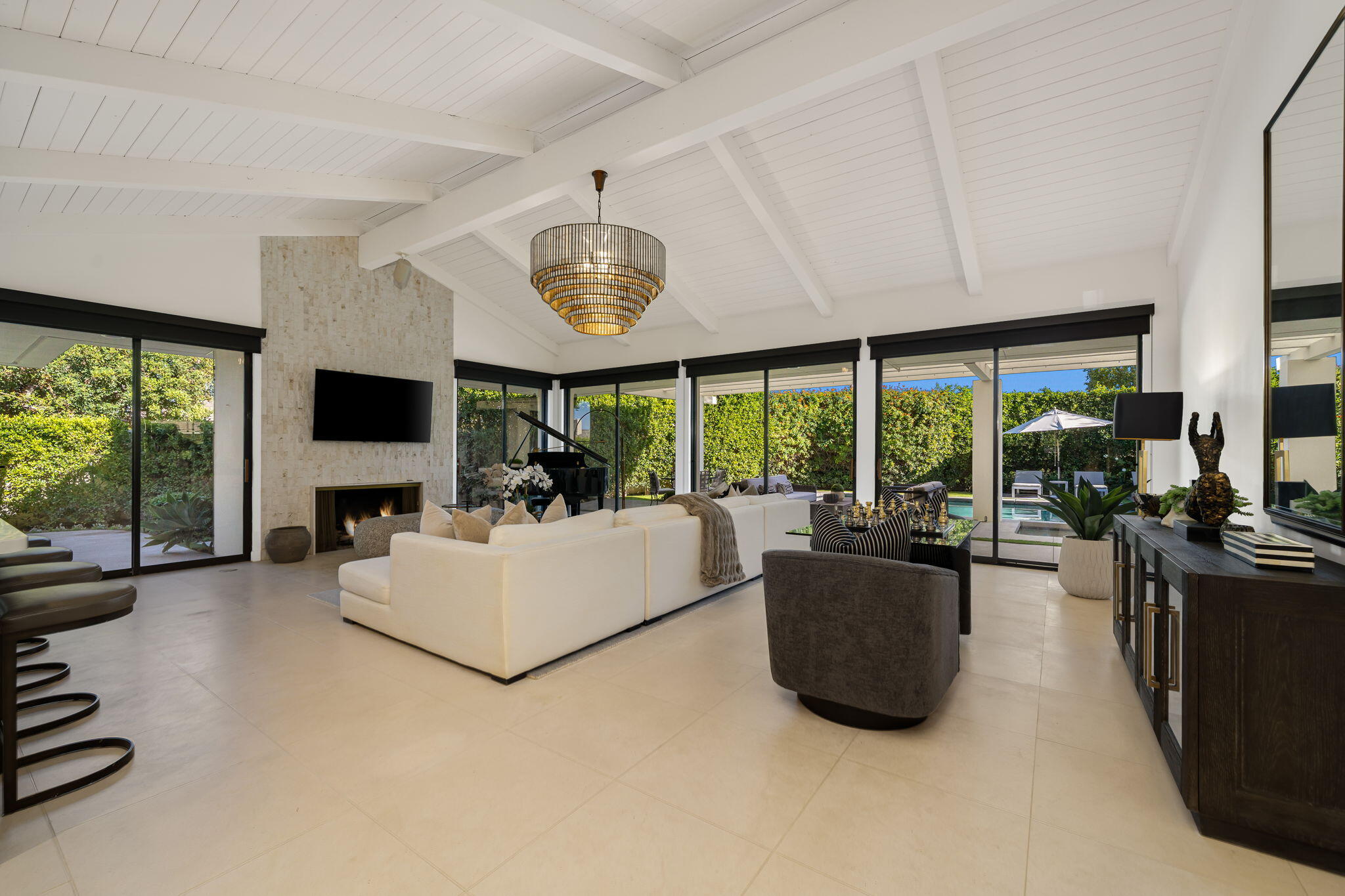 6 Exeter Court Rancho Mirage, CA 92270 - Photo 11 of 54 a living room with furniture and a flat screen tv
