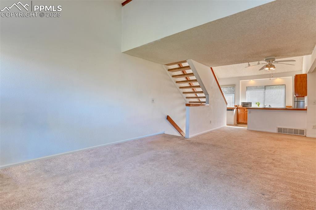 St, Unit A Colorado Springs, CO 80906 - Photo 19 of 37 a view of an empty room with a window