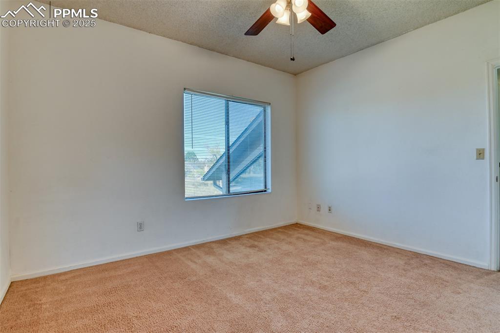 St, Unit A Colorado Springs, CO 80906 - Photo 29 of 37 an empty room with a window