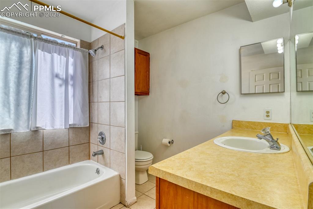 St, Unit A Colorado Springs, CO 80906 - Photo 6 of 37 a bathroom with a sink and a bathtub