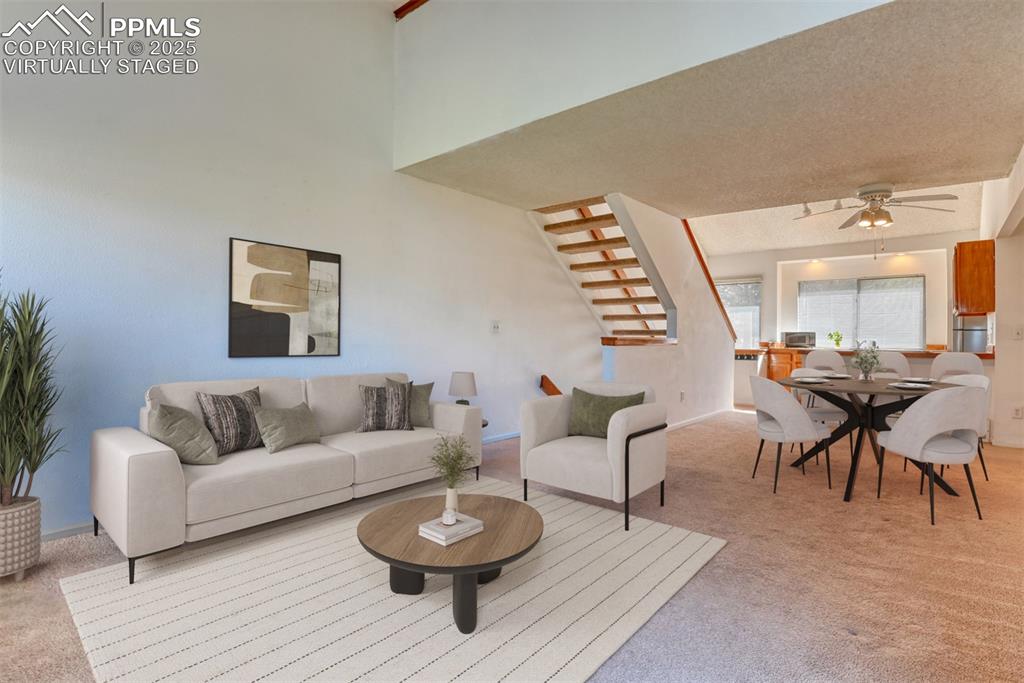St, Unit A Colorado Springs, CO 80906 - Photo 10 of 37 a living room with furniture and a wooden floor