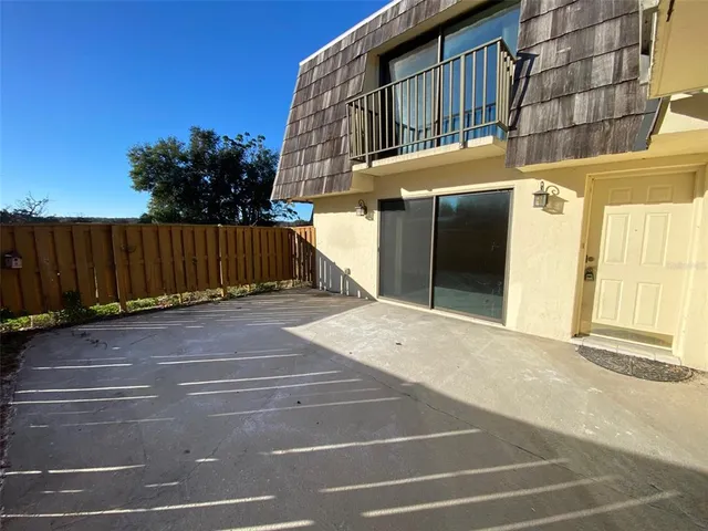 a view of a brick building with many windows