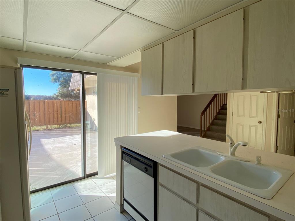 2911 Pecan Avenue Leesburg, FL 34748 - Photo 8 of 26 a bathroom with a sink and a mirror