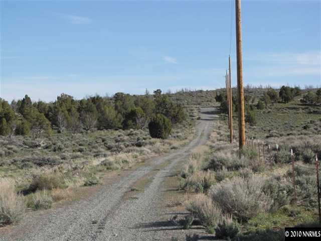 14465 Hope Lane, Unit 75 Reno, NV 89508 - Photo 6 of 7 a view of a dry yard with trees