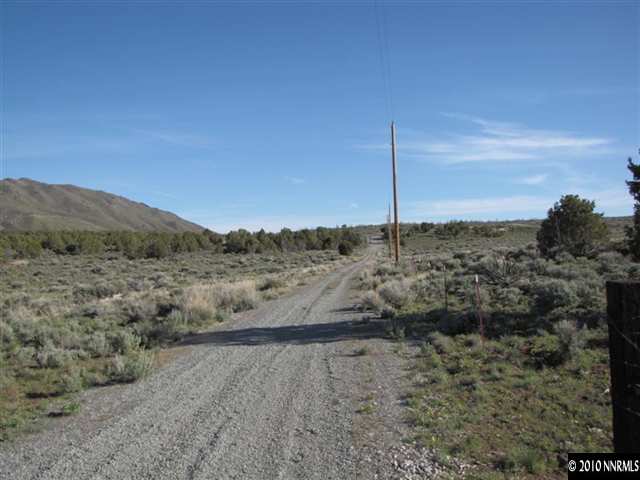 14465 Hope Lane, Unit 75 Reno, NV 89508 - Photo 7 of 7 a view of a road with a mountain in the background