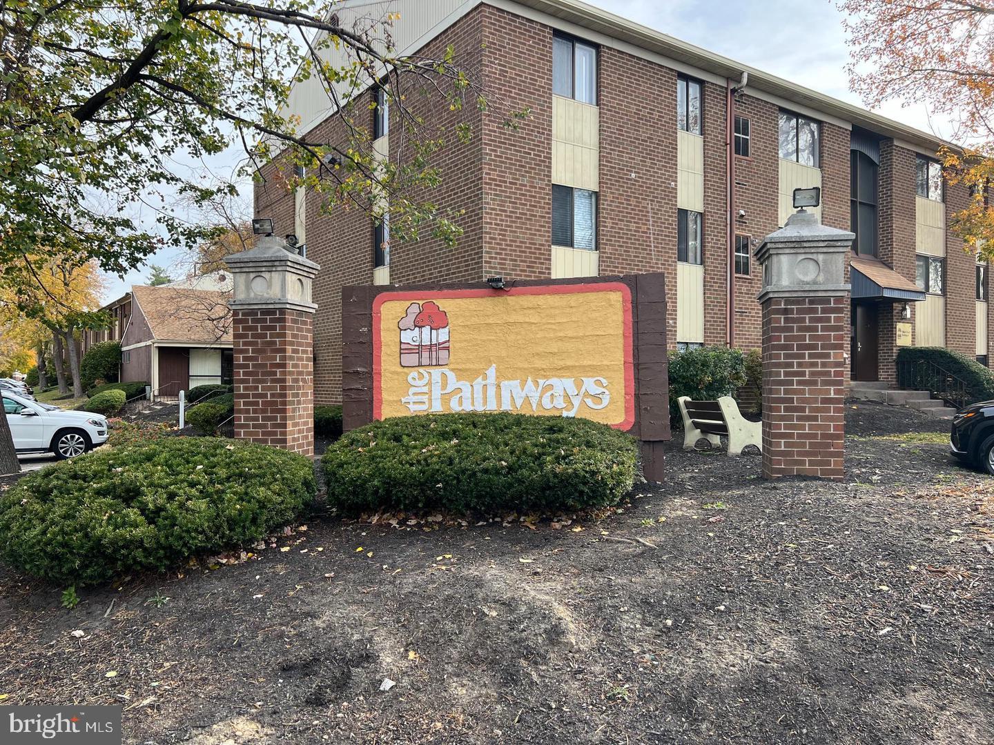 9921 Bustleton Avenue, Unit T10 Philadelphia, PA 19115 - Photo 2 of 4 a front view of a house with garden