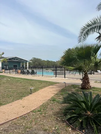 a view of a yard and entertaining space