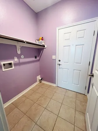 a view of a room with an empty space