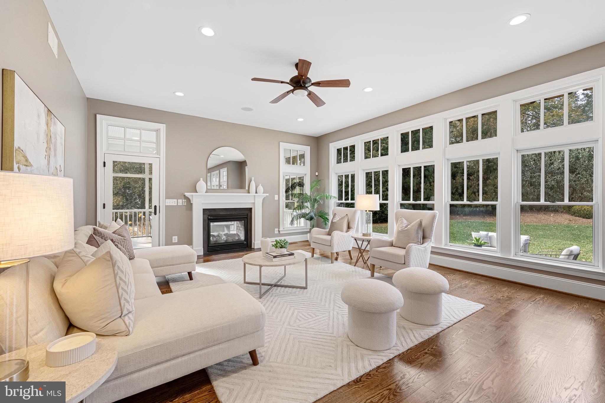 6520 Topeka Road McLean, VA 22101 - Photo 20 of 67 a living room with furniture large window and fireplace