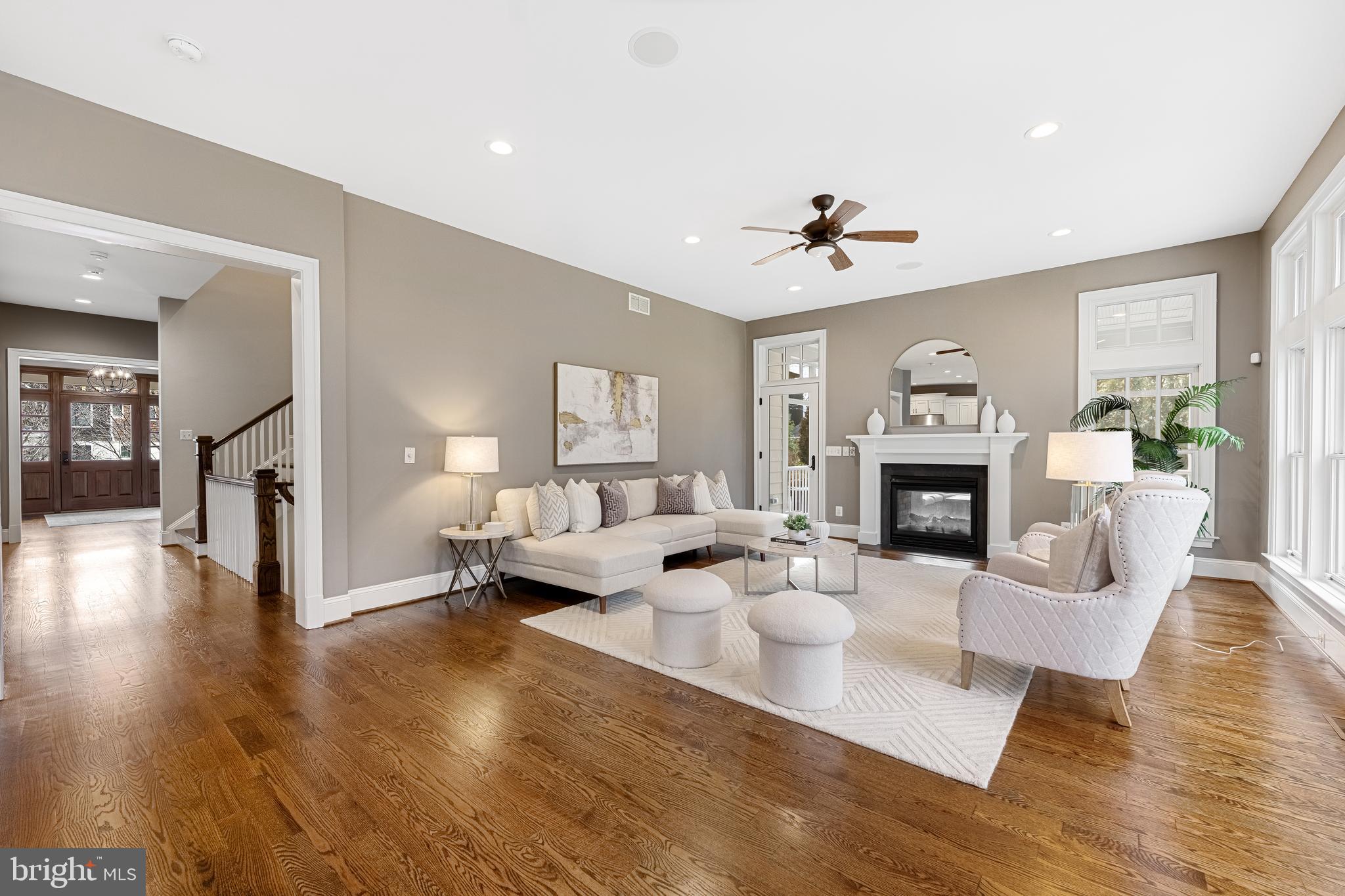 6520 Topeka Road McLean, VA 22101 - Photo 21 of 67 a living room with fireplace furniture and a wooden floor