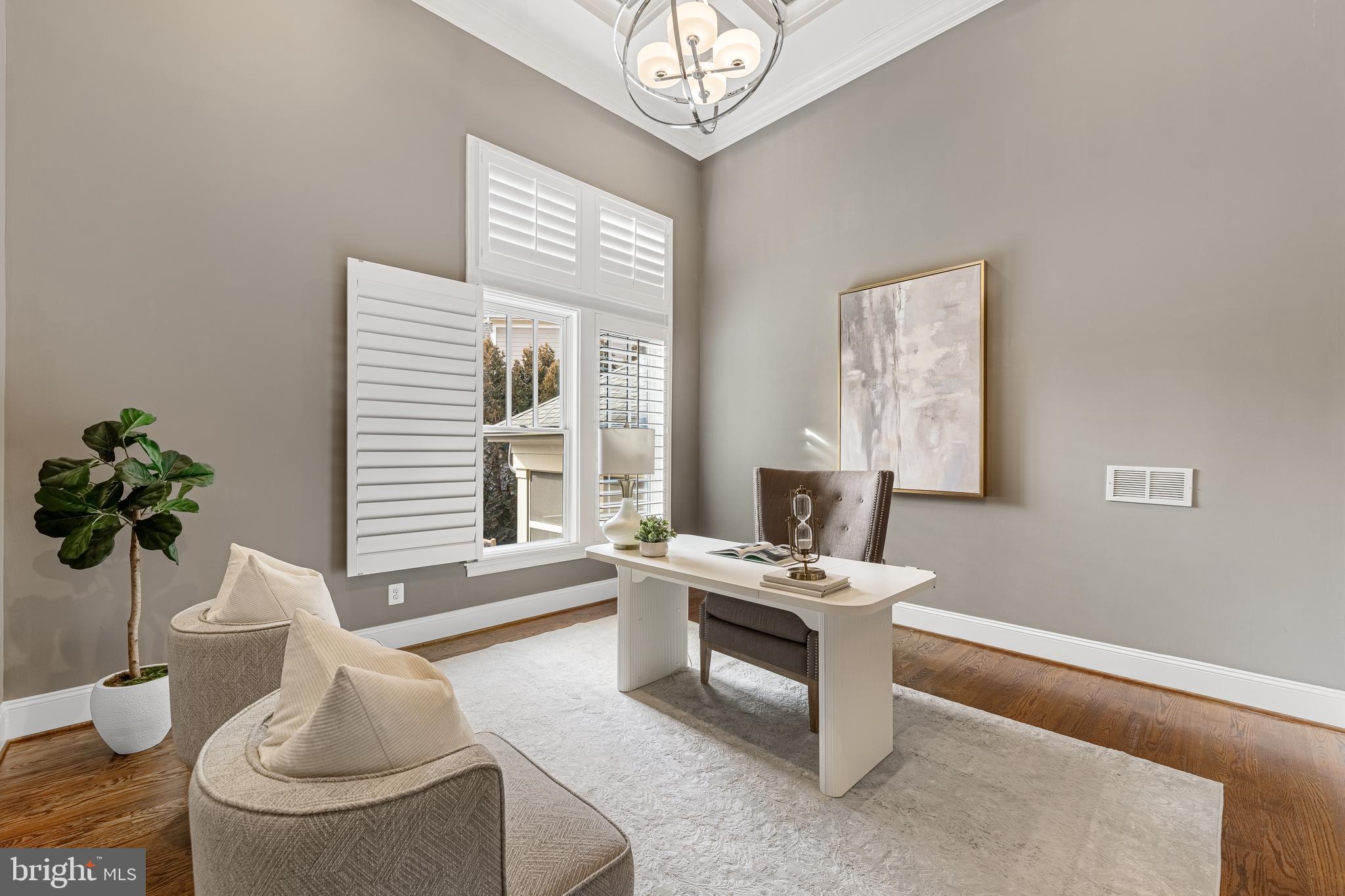 6520 Topeka Road McLean, VA 22101 - Photo 27 of 67 a living room with furniture a window and a potted plant