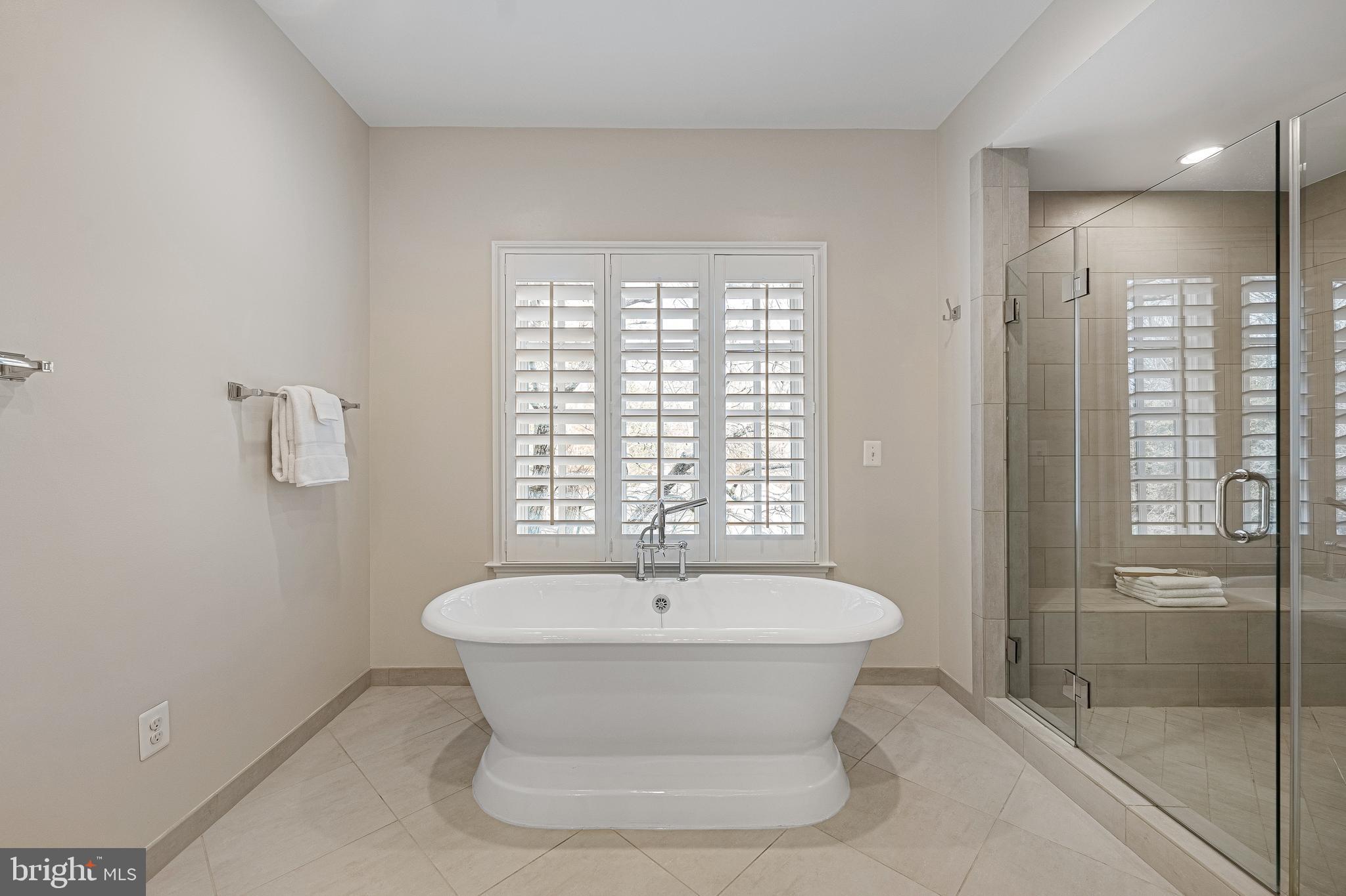 6520 Topeka Road McLean, VA 22101 - Photo 38 of 67 a bathroom with a sink and a mirror