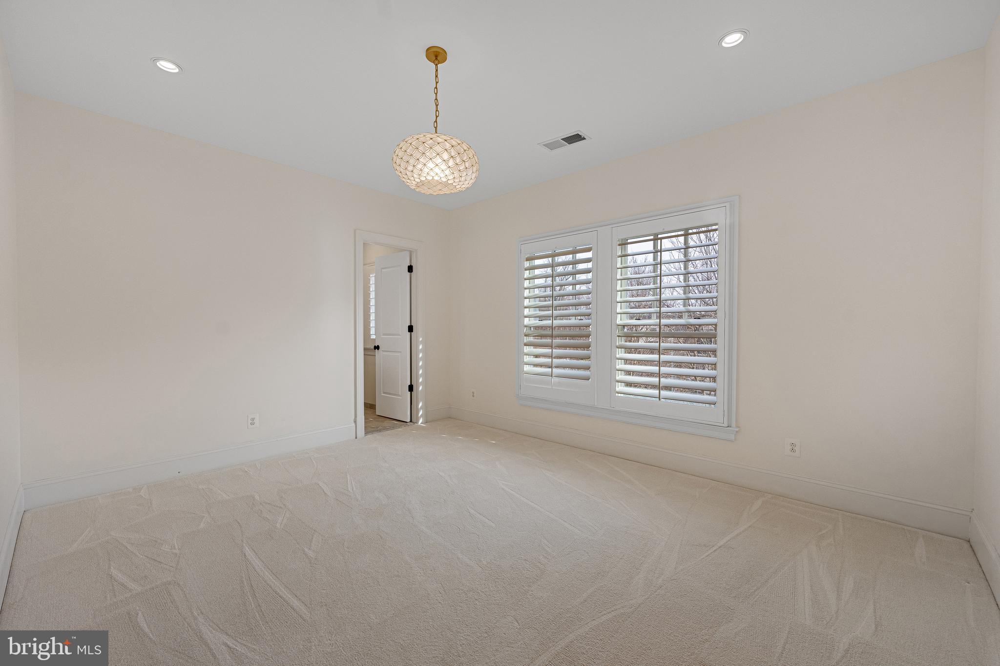6520 Topeka Road McLean, VA 22101 - Photo 44 of 67 a view of an empty room with a window