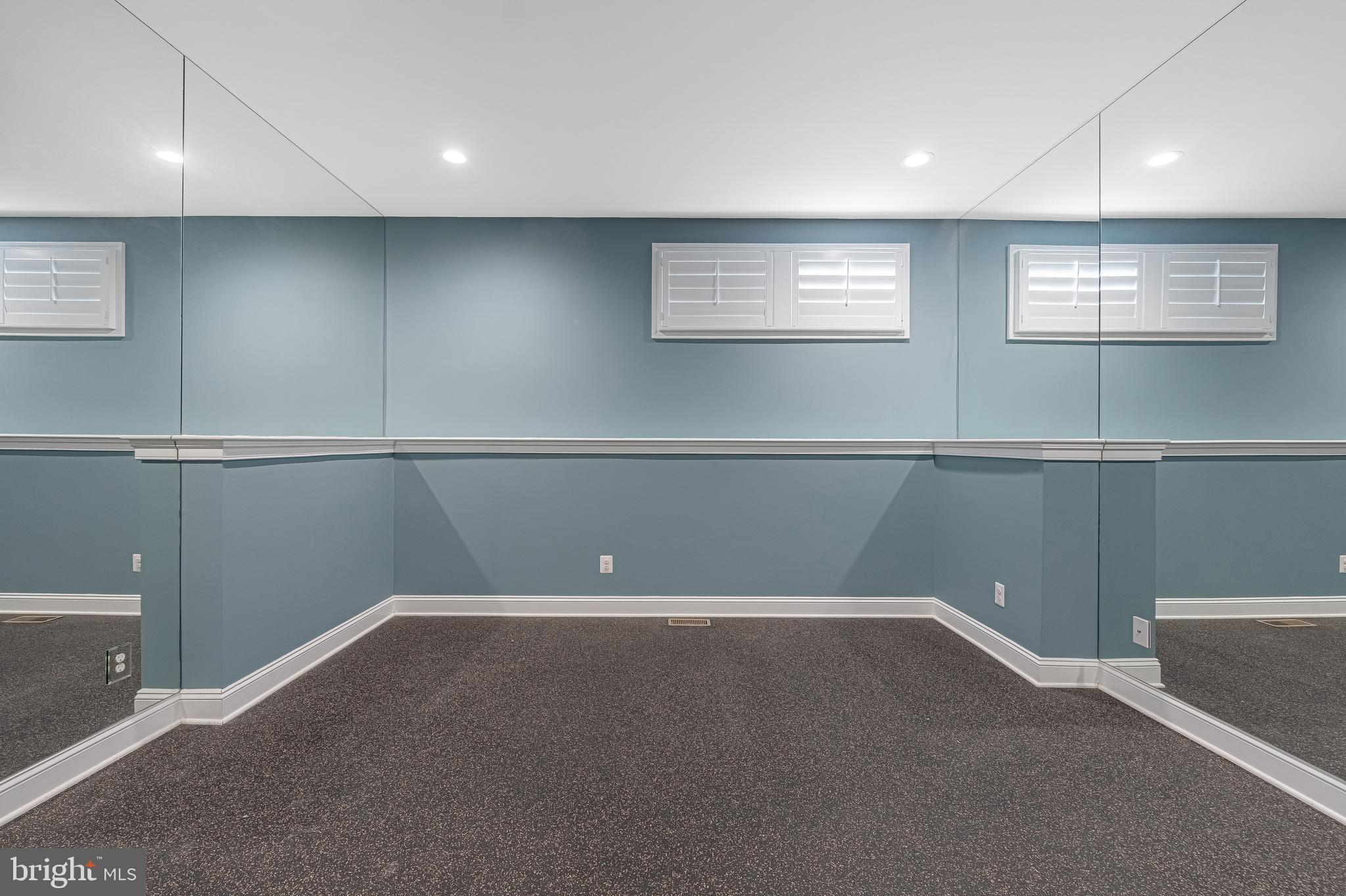 6520 Topeka Road McLean, VA 22101 - Photo 53 of 67 a view of a air conditioner and an empty room with windows