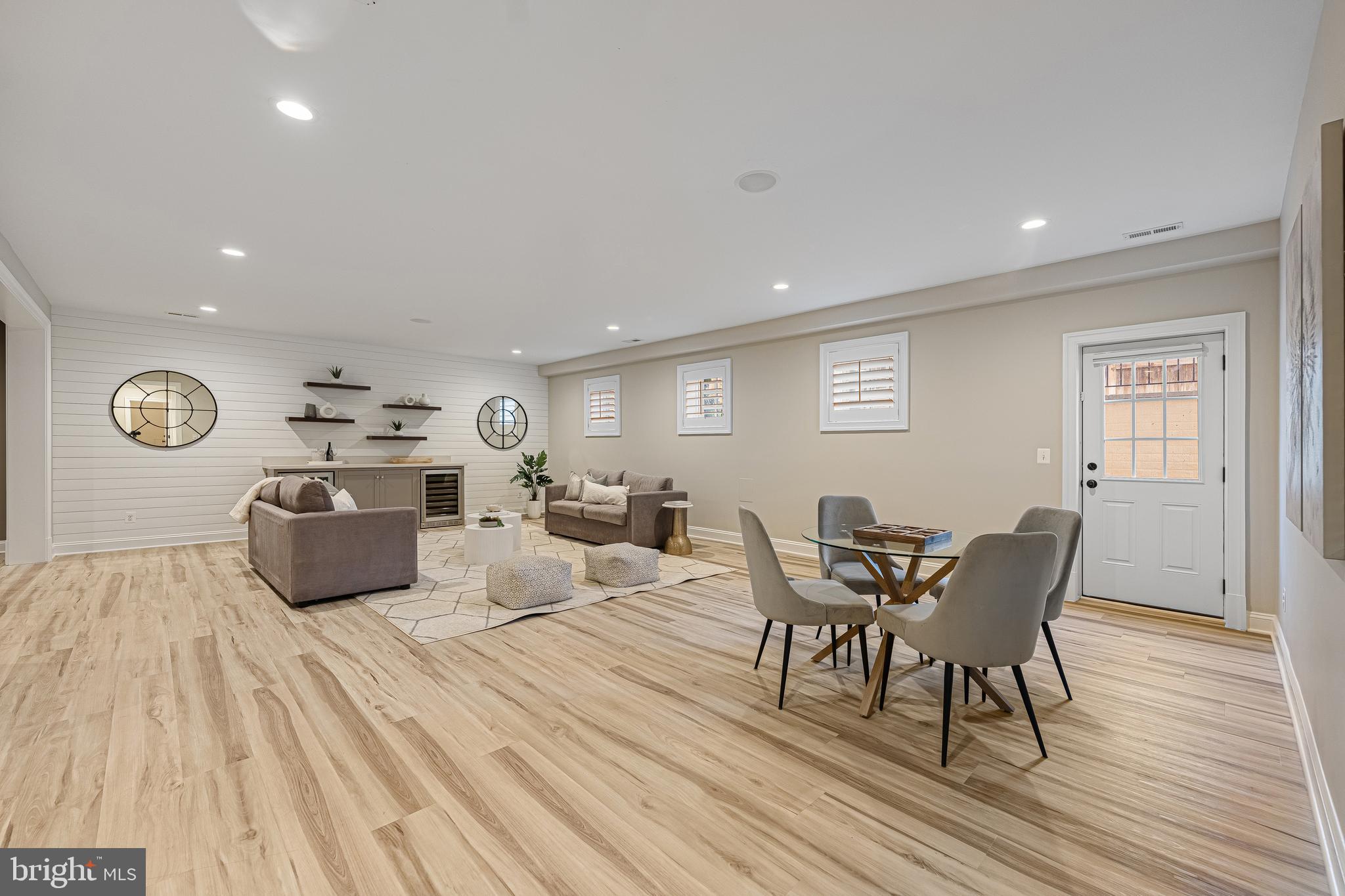 6520 Topeka Road McLean, VA 22101 - Photo 56 of 67 a living room with furniture a rug and wooden floor