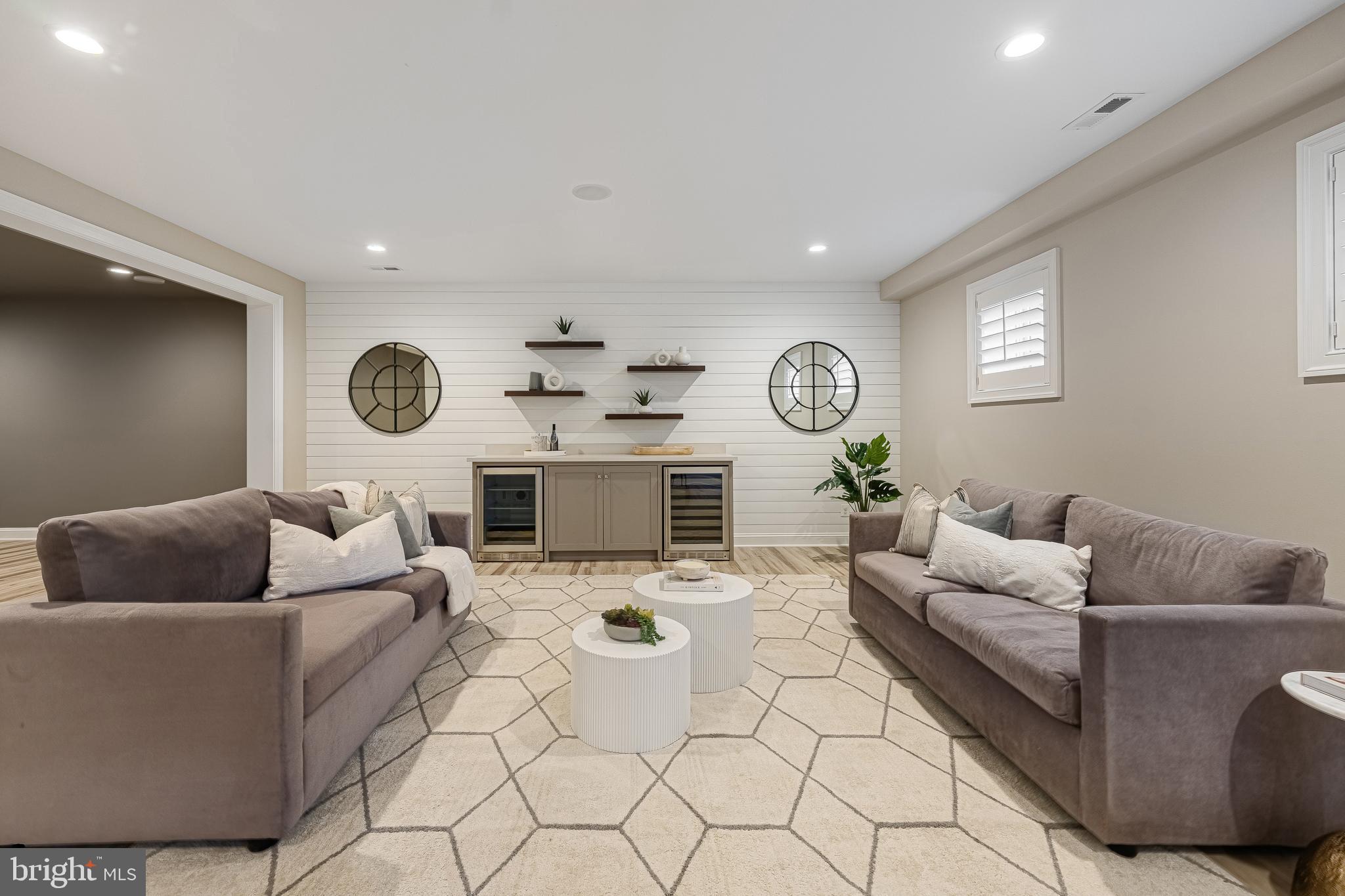 6520 Topeka Road McLean, VA 22101 - Photo 57 of 67 a living room with furniture and a fireplace