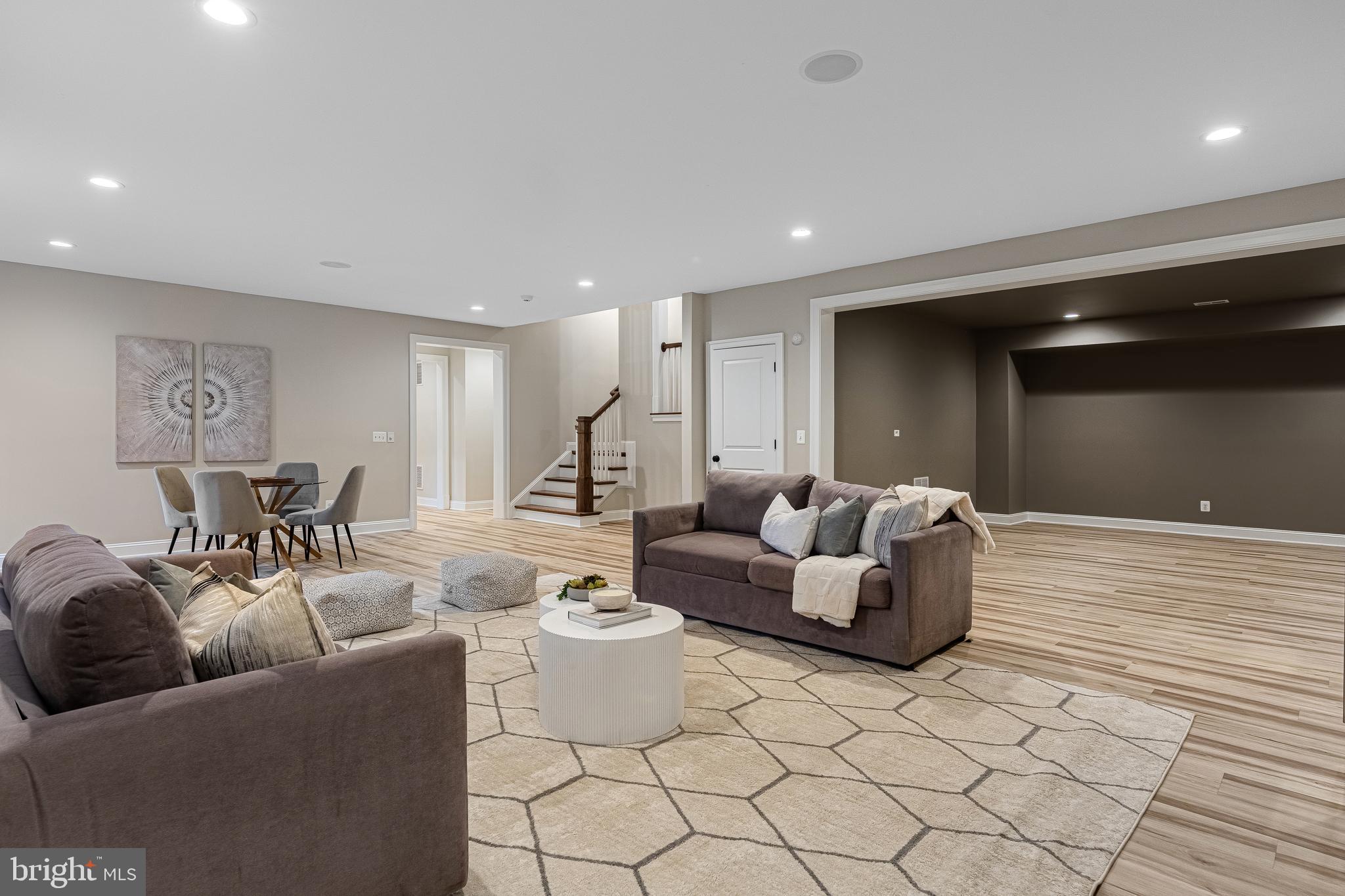 6520 Topeka Road McLean, VA 22101 - Photo 58 of 67 a living room with furniture and a wooden floor