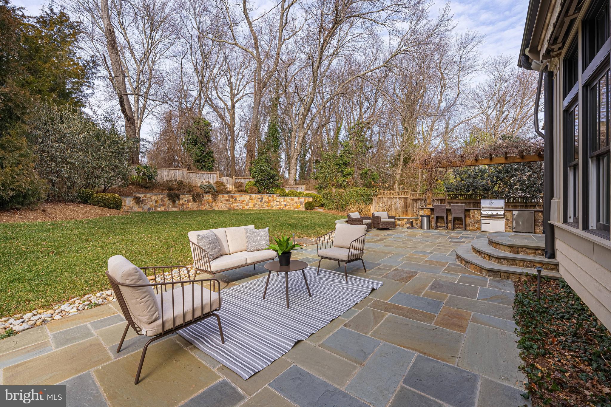 6520 Topeka Road McLean, VA 22101 - Photo 65 of 67 a view of a patio with dining table and chairs with garden view
