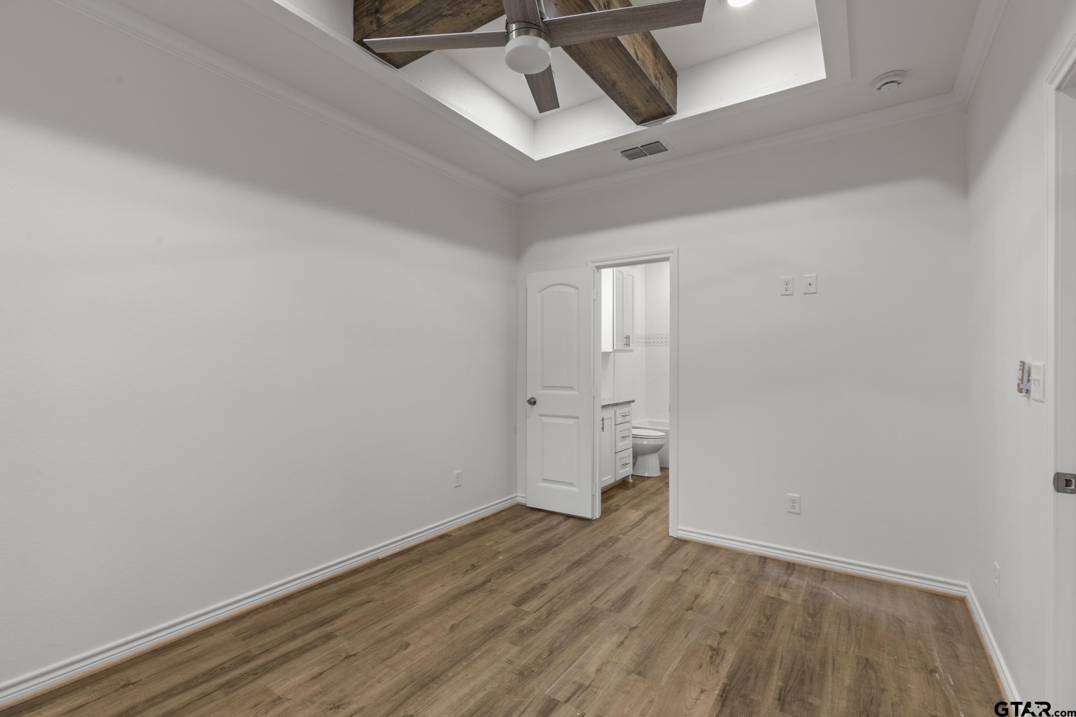 712 West 3rd Tyler, TX 75701 - Photo 19 of 28 wooden floor in an empty room