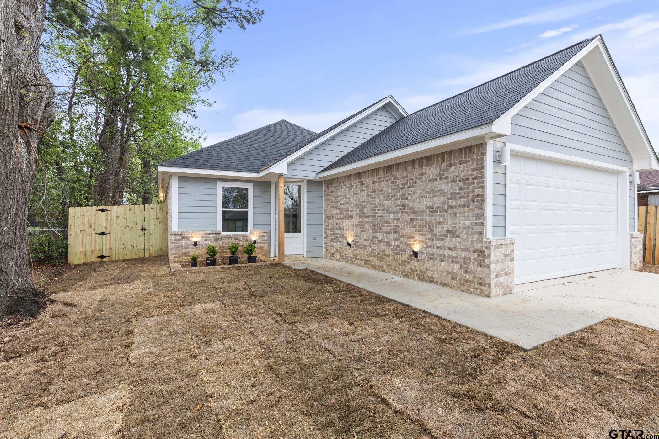 712 West 3rd Tyler, TX 75701 - Photo 3 of 28 a view of backyard of house