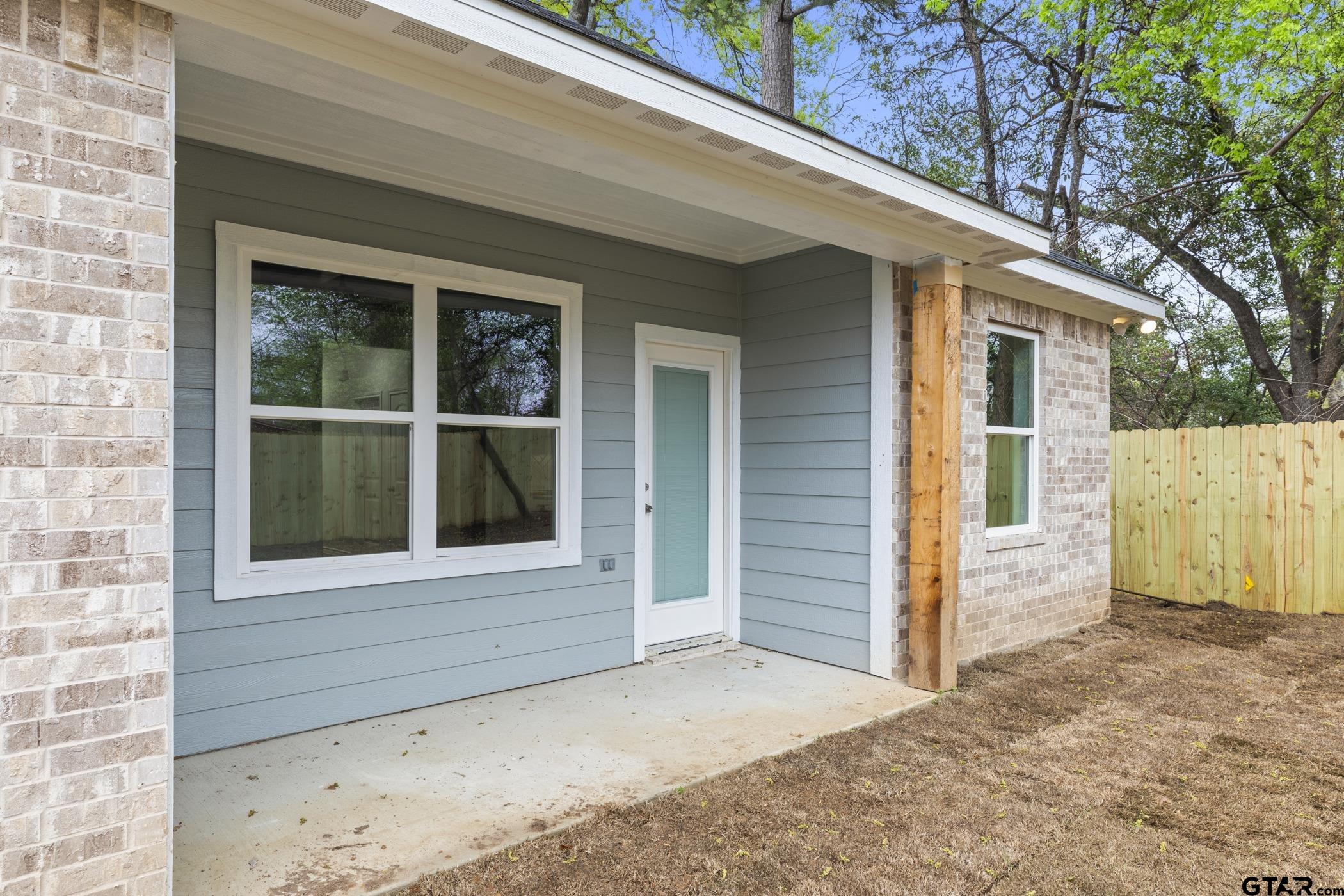712 West 3rd Tyler, TX 75701 - Photo 6 of 28 a view of entrance of house and window