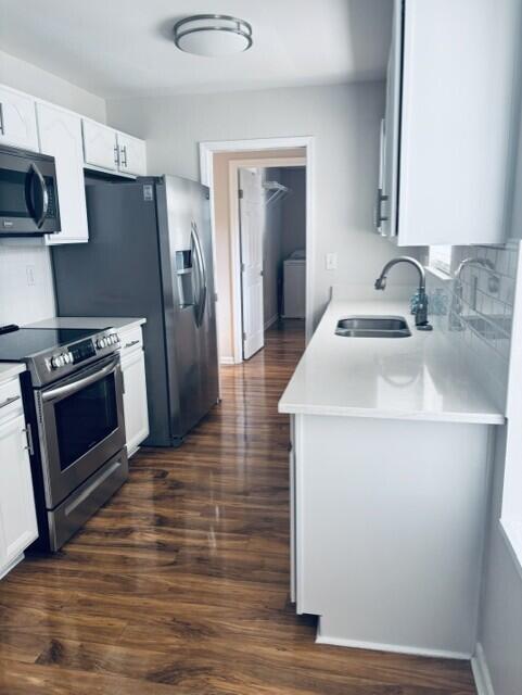 402 Juniper Street Destin, FL 32541 - Photo 5 of 20 a kitchen with sink a refrigerator and a stove