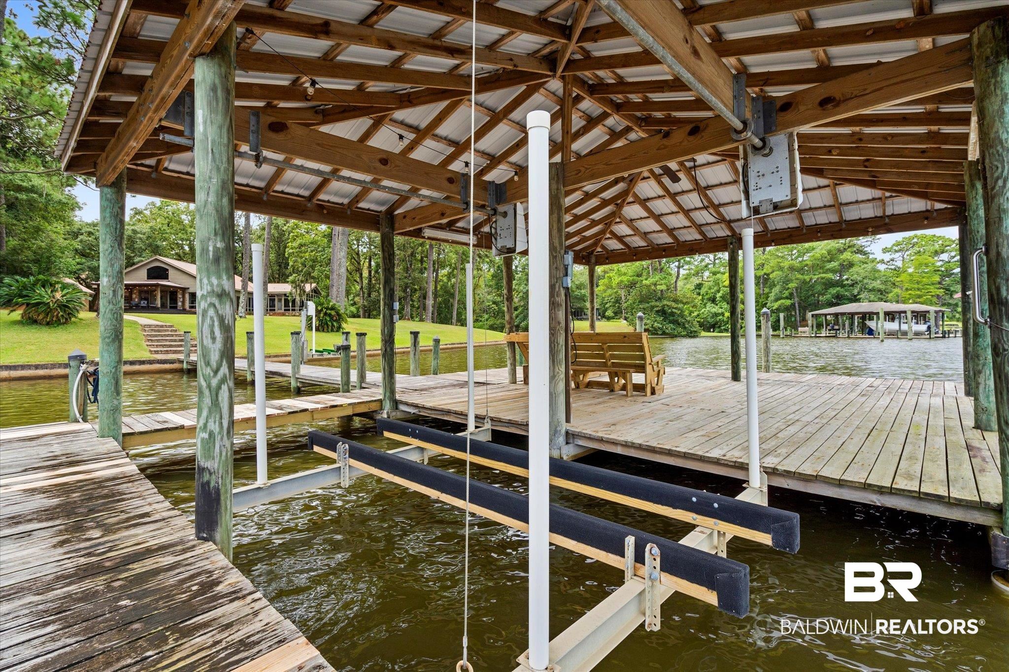 2228 Riverside Drive Mobile, AL 36605 - Photo 33 of 51 View of dock with a water view
