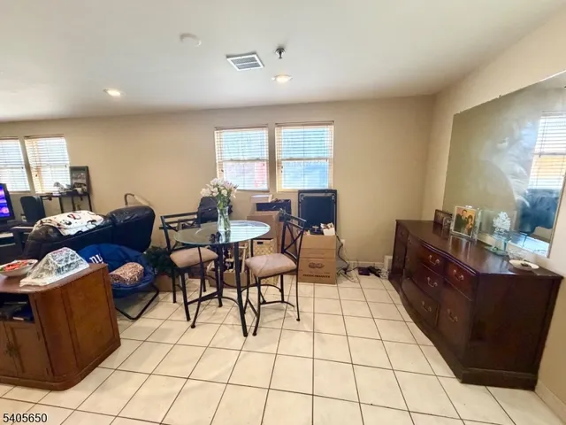 a bed room with a bed and a window