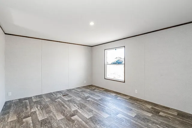 a view of a room that has a window in it