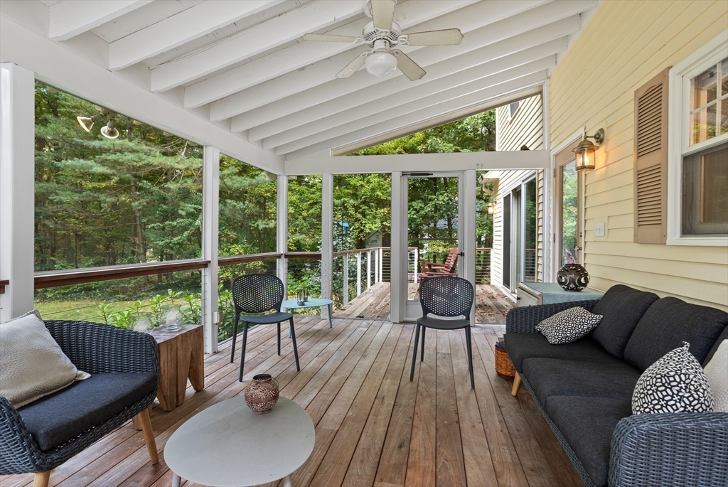 40 Richardson Road Boxborough, MA 01719 - Photo 18 of 39 a balcony with furniture and a garden