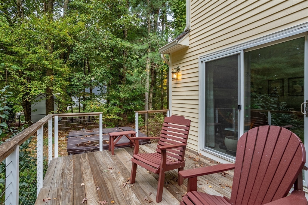 40 Richardson Road Boxborough, MA 01719 - Photo 21 of 39 a view of balcony with wooden floor and outdoor seating