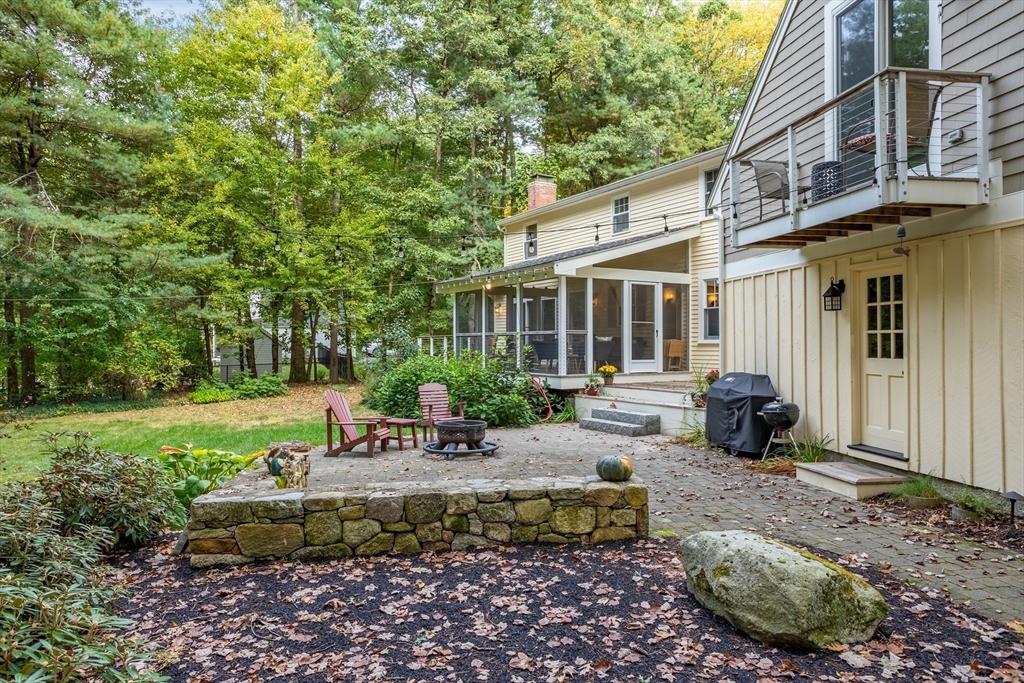 40 Richardson Road Boxborough, MA 01719 - Photo 3 of 39 a view of a house with backyard sitting area and garden
