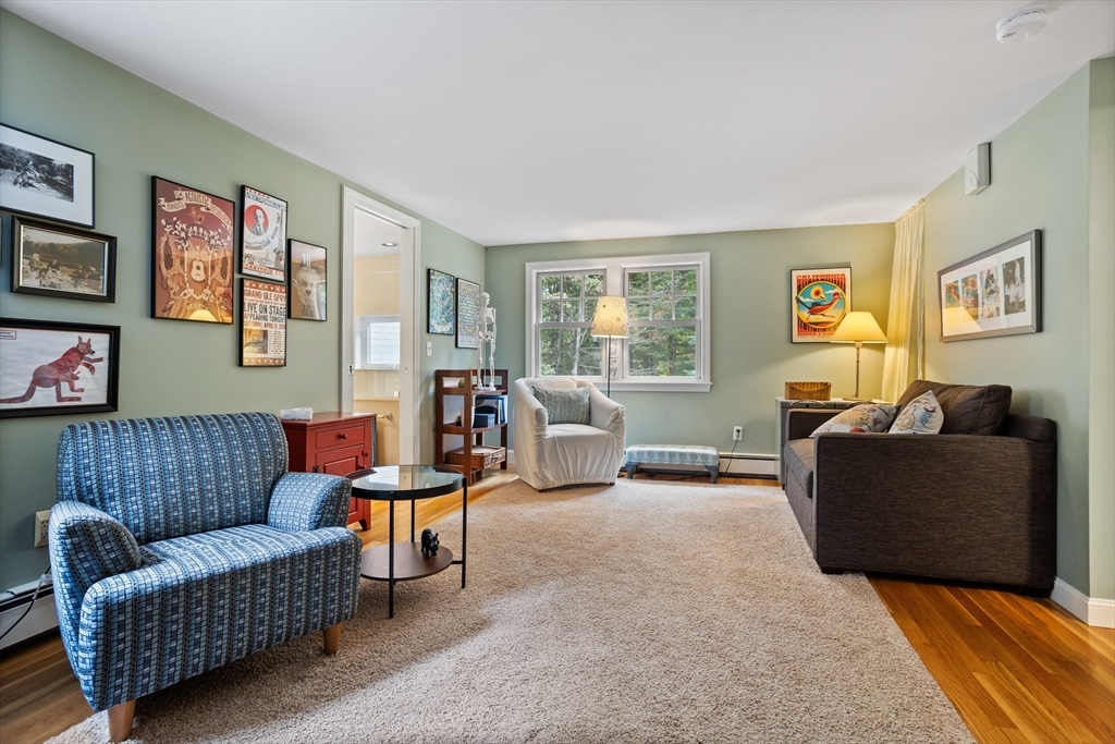 40 Richardson Road Boxborough, MA 01719 - Photo 31 of 39 a living room with furniture a couch and two windows