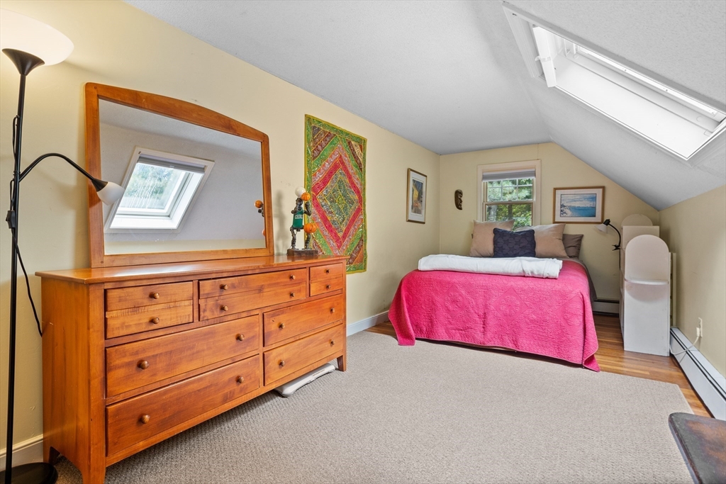 40 Richardson Road Boxborough, MA 01719 - Photo 35 of 39 a bedroom with a bed and a dresser