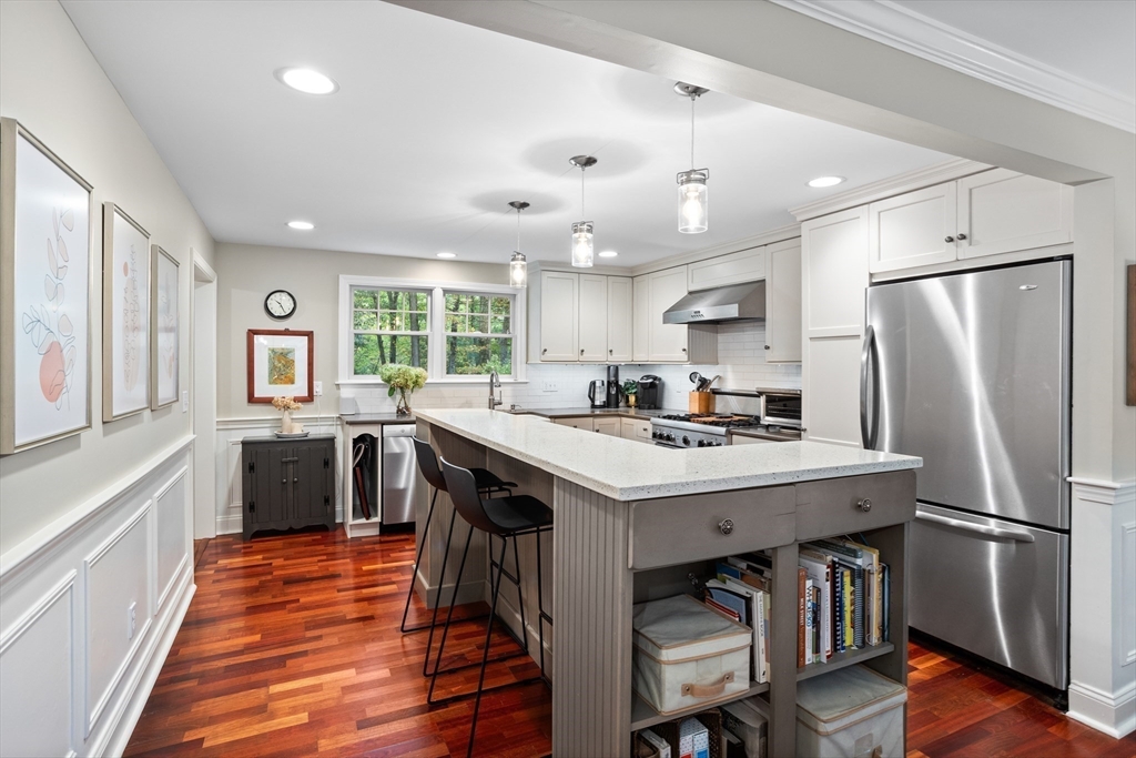 40 Richardson Road Boxborough, MA 01719 - Photo 5 of 39 a kitchen with kitchen island a sink stove and refrigerator